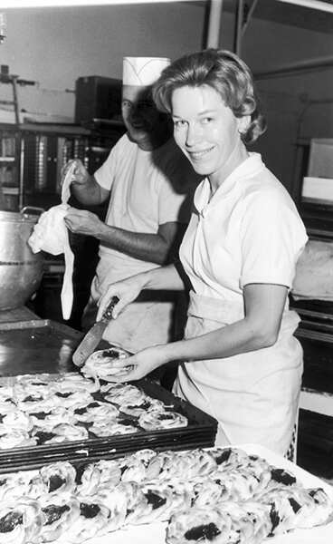 Myrna and Ray baking in a kitchen