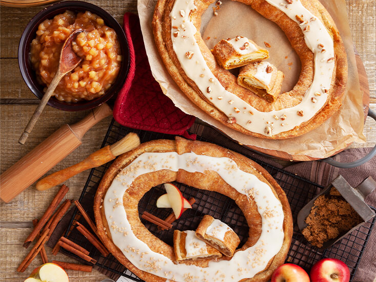 Our Pumpkin Caramel Kringle and Apple Kringle on table spread made for fall