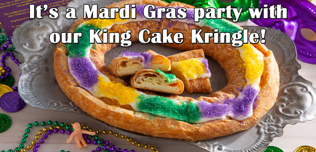 Let the good times roll! Our Cream Cheesecake Kringle, decorated for Mardi Gras with a baby and beads too! - Item number: 200 - King Cake Kringle