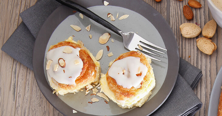 Our almond custard seven sisters coffee cake features spiraled rolls filled with creamy almond filling and smooth custard.