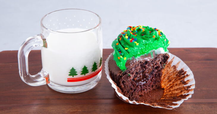 Indulge in our Christmas Tree Chocolate Ganache Cupcake, available for cupcake delivery, making it the perfect festive treat for your holiday gatherings and a delightful gift for friends and family!