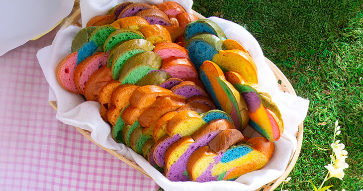 Braided Easter bread centerpiece on a festive table with vibrant colors and soft, fluffy slices ? perfect for Easter brunch.