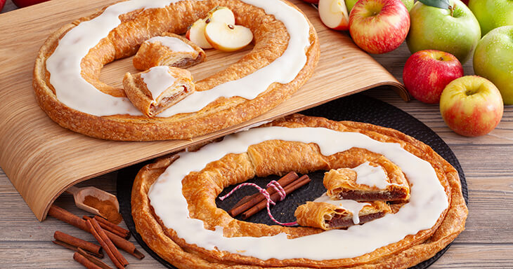 Discover the delicious apple kringle and cinnamon roll kringle from a Racine Danish Kringle bakery, a perfect blend of flavors that will delight your taste buds!