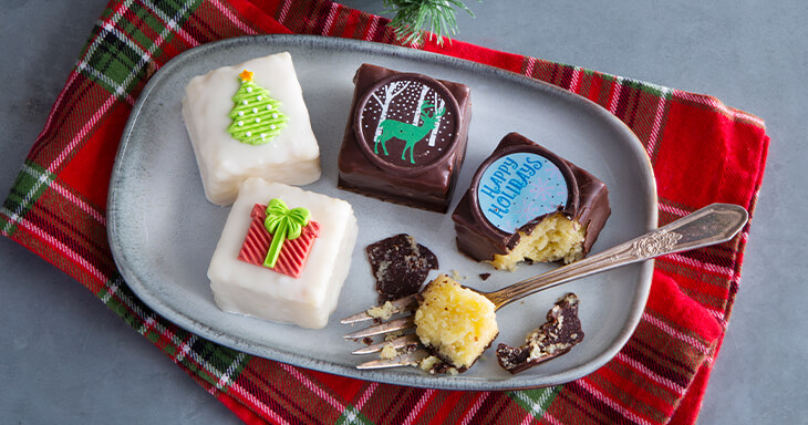 Each petit four features a festive decoration, offering a delightful surprise for each day of the twelve days of Christmas.