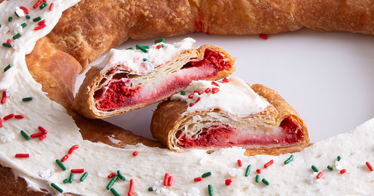 Discover Santa's secret Red Velvet cake recipe, perfectly layered with a silky smooth vanilla pudding, and elevate your dessert game by adding a delicious Danish kringle for an irresistible treat this holiday season!