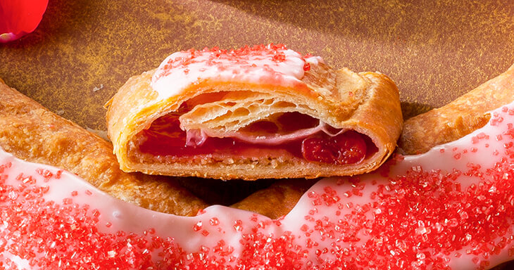 Celebrate Valentine?s Day with our delightful Valentine Cherry Heart-Shaped Kringle! Made with fresh Door County cherries, this exquisite Danish pastry is the perfect way to show your love.