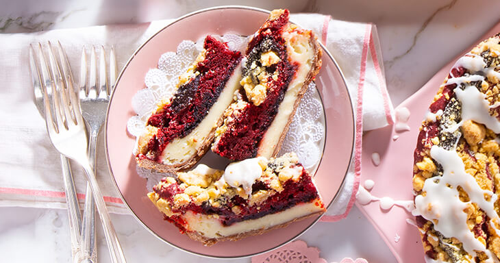 Indulge in our delightful Valentine's Day Coffee Cake, featuring a buttery streusel topping and silky smooth cheesecake layers that will make your heart skip a beat. Order now and have this delicious coffee cake shipped straight to your door for a memorable celebration!